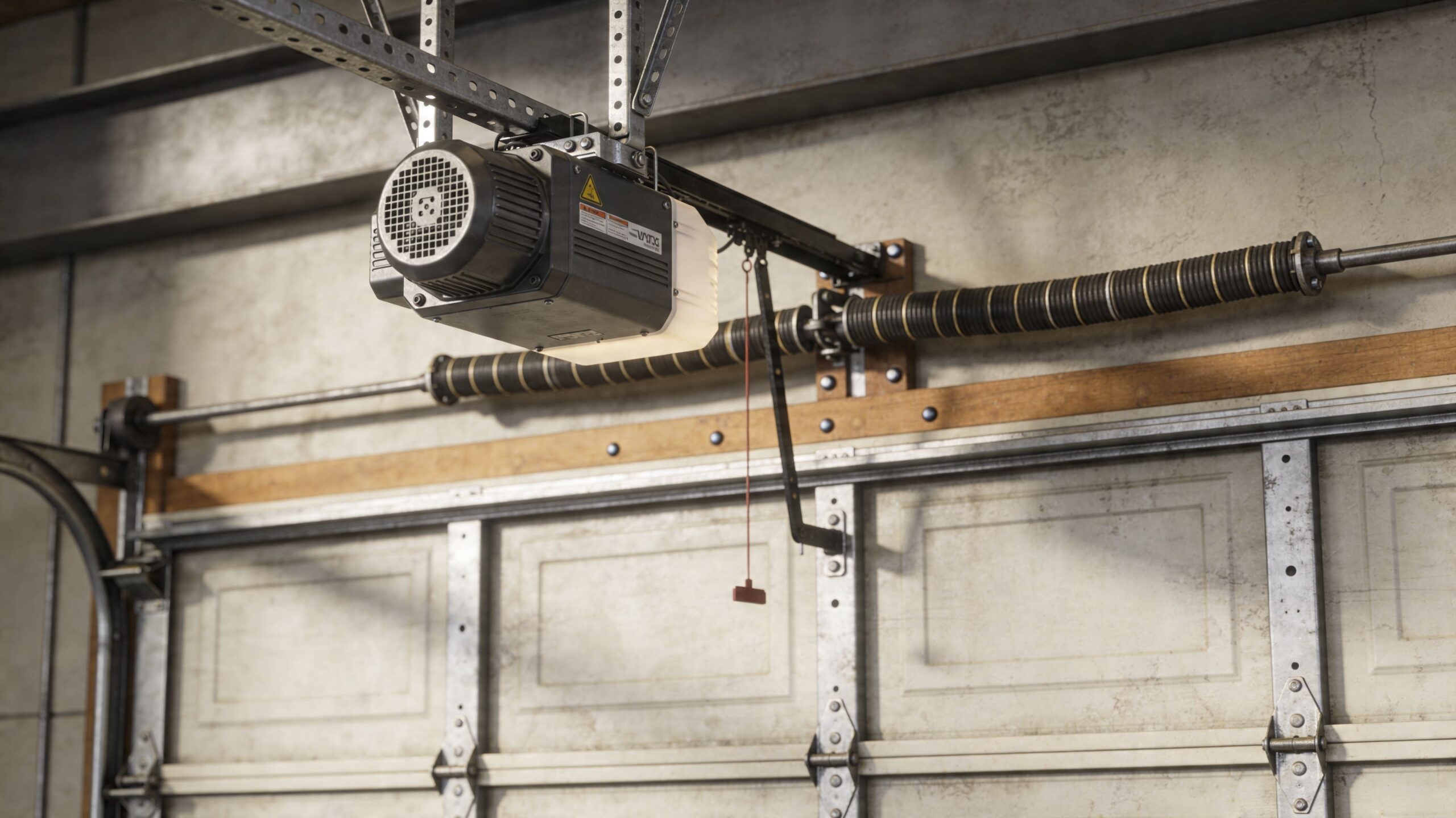 A modern garage door opener motor mounted on the ceiling above a sectional garage door mechanism.