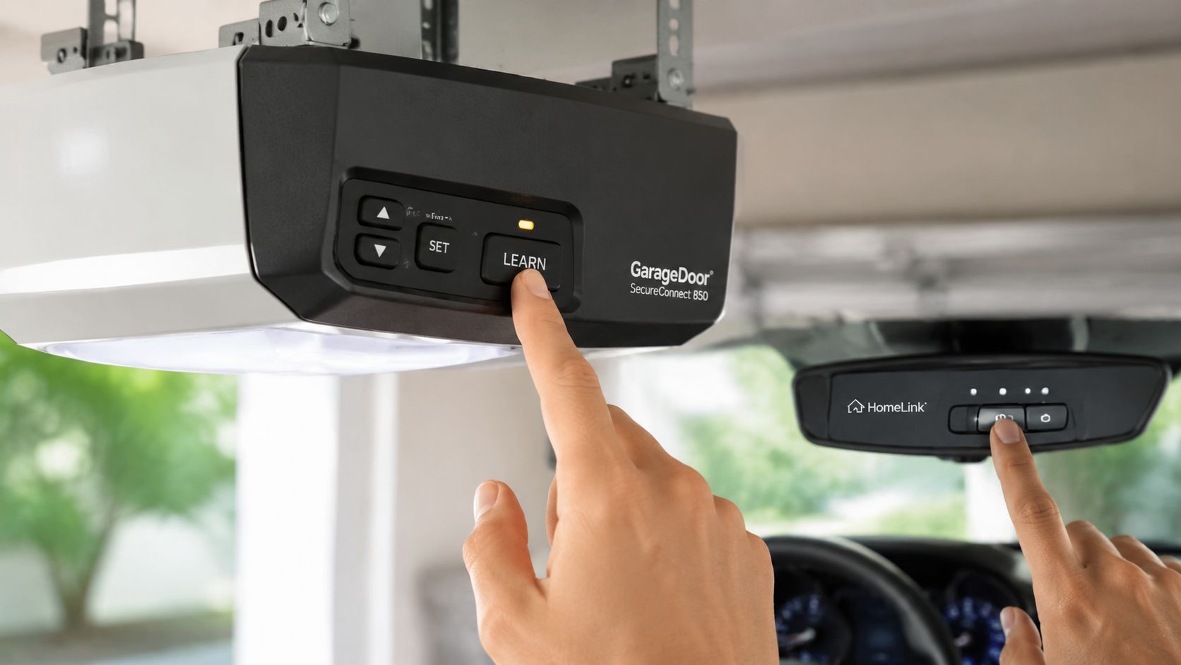 A person pairs a HomeLink car mirror remote with a GarageDoor SecureConnect 850 opener unit.